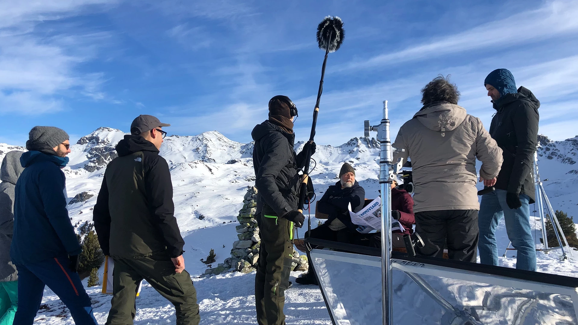 behind the scene picture in the mountains with all the crew